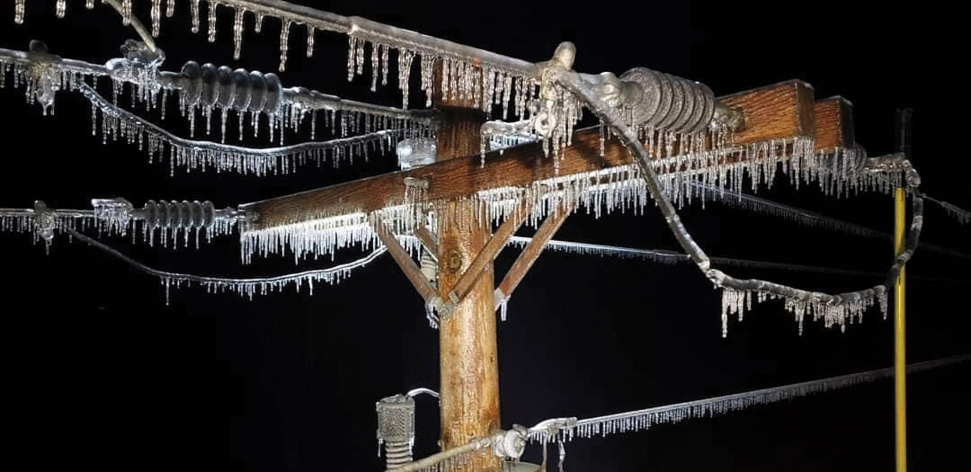 Linemen were met with extremely iced-over electric poles and transformers as they worked around the clock to restore power to White Countians. (Photo courtesy of CANEY FORK ELECTRIC)
